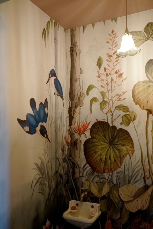 Panorama behang in het toilet.